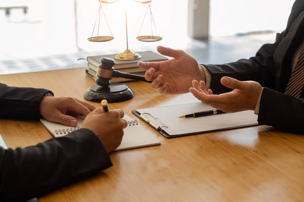 Photo of people at desk