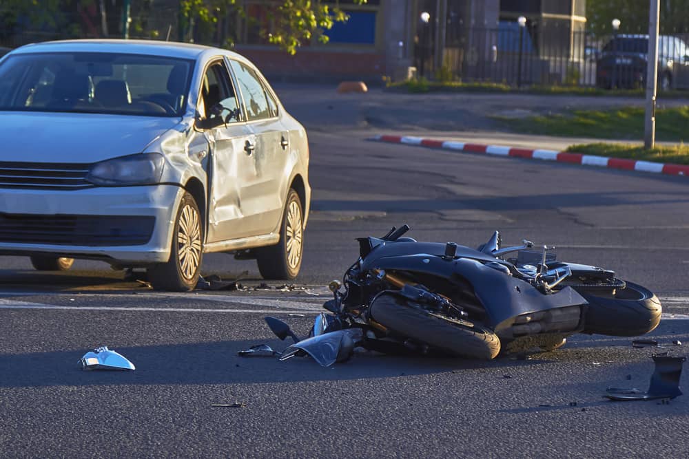 Motorcycle Laying On The Road After An Accident